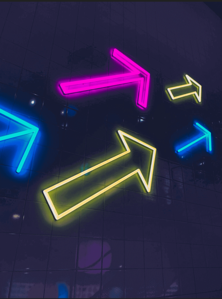 neon arrows pointing to the right
