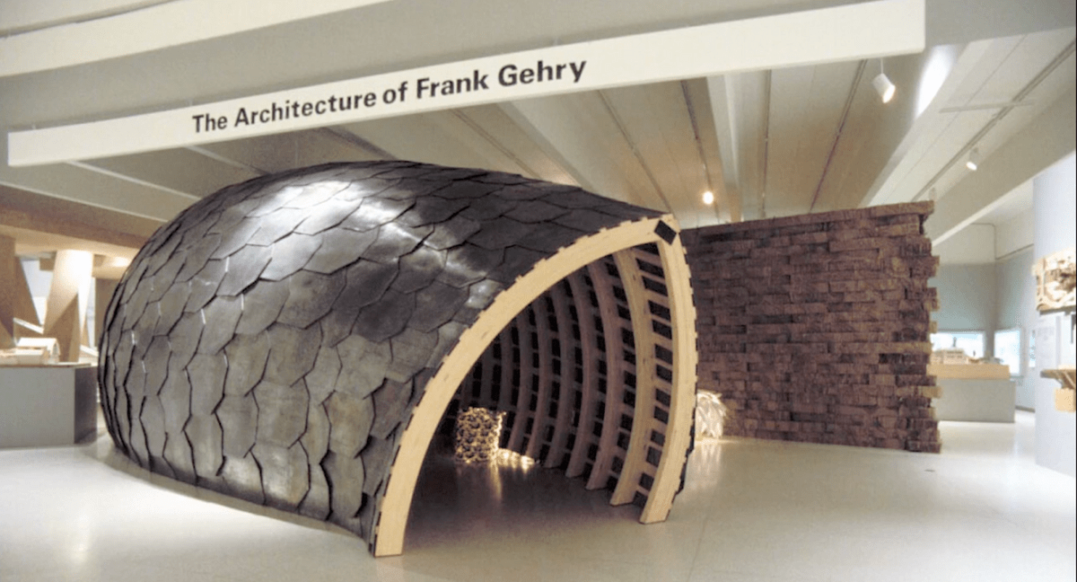 A sign showing off architecture designs by Frank Gehry