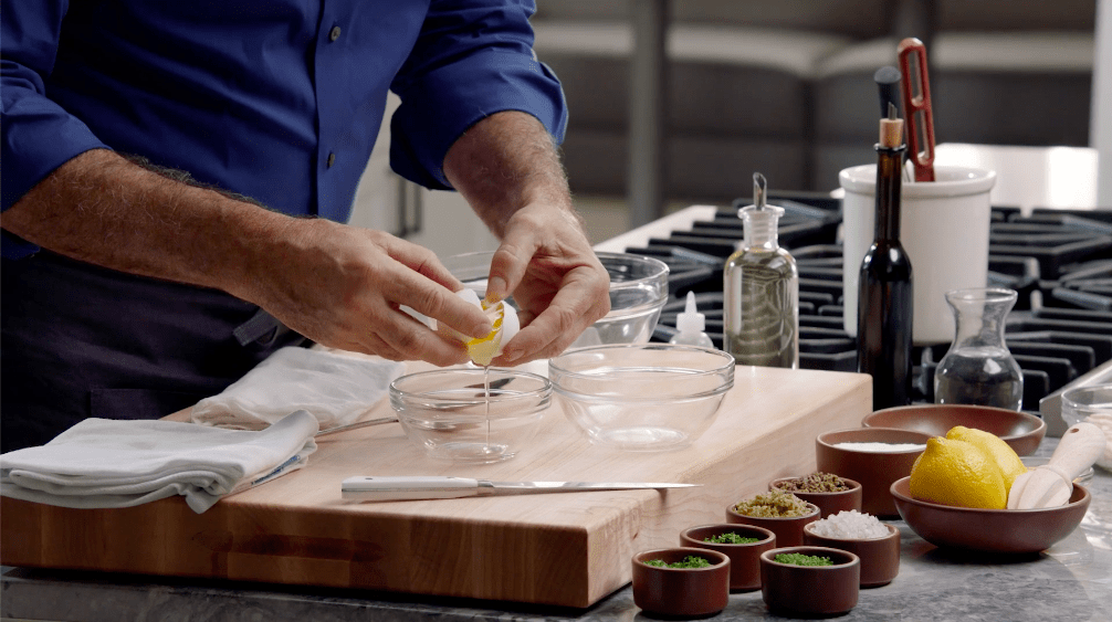 Image of Thomas Keller preparing eggs in the Mayonnaise section of his MasterClass