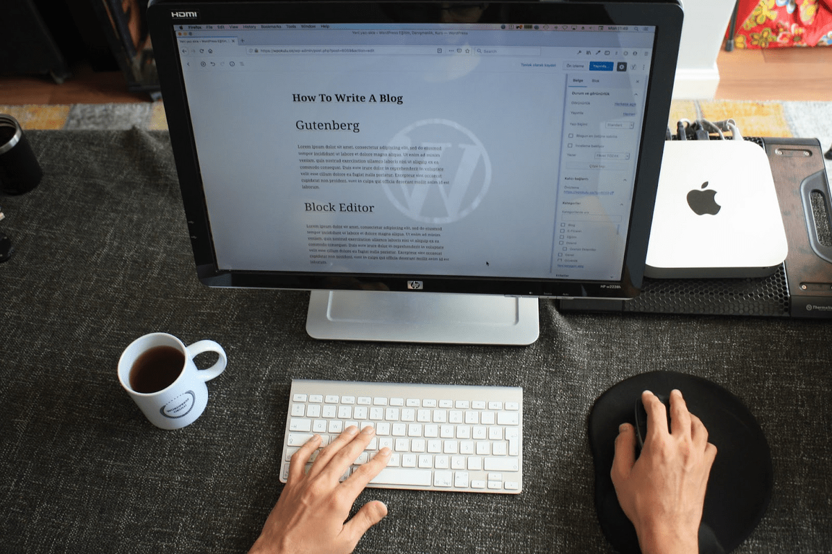 Writer on a laptop writing a blog post
