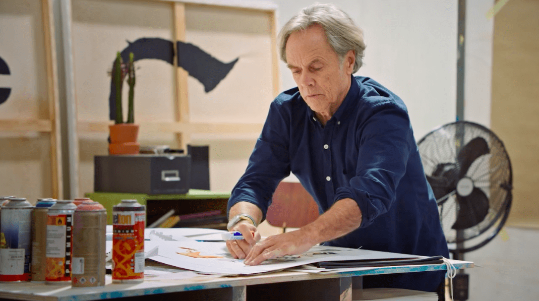  David Carson designing on table